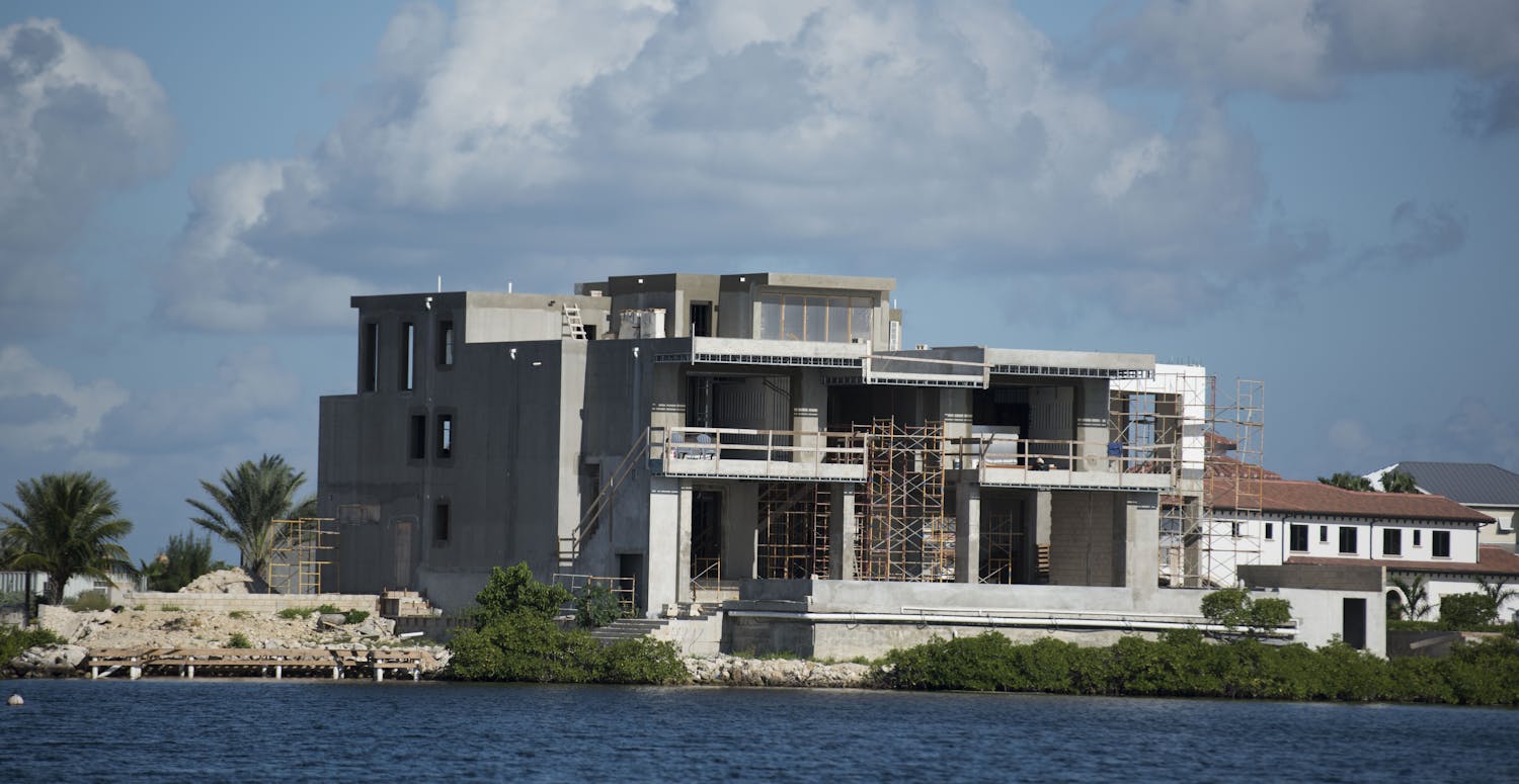Building a big home in the cayman islands on the canal
