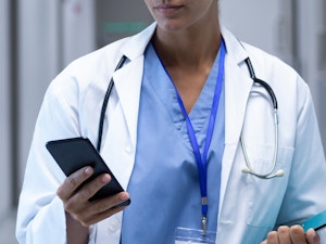 Doctor consulting with patient for video call