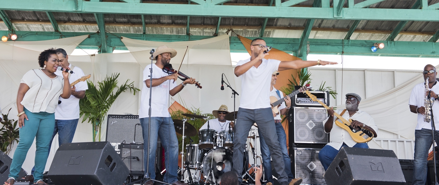 Group of Caymanian musicians on stage performing