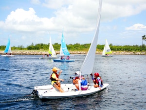 Several sailing boats in the waters of the Cayman Islands