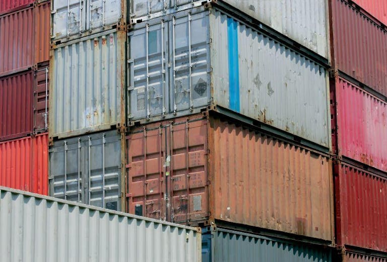 Shipping containers stacked on top of each other