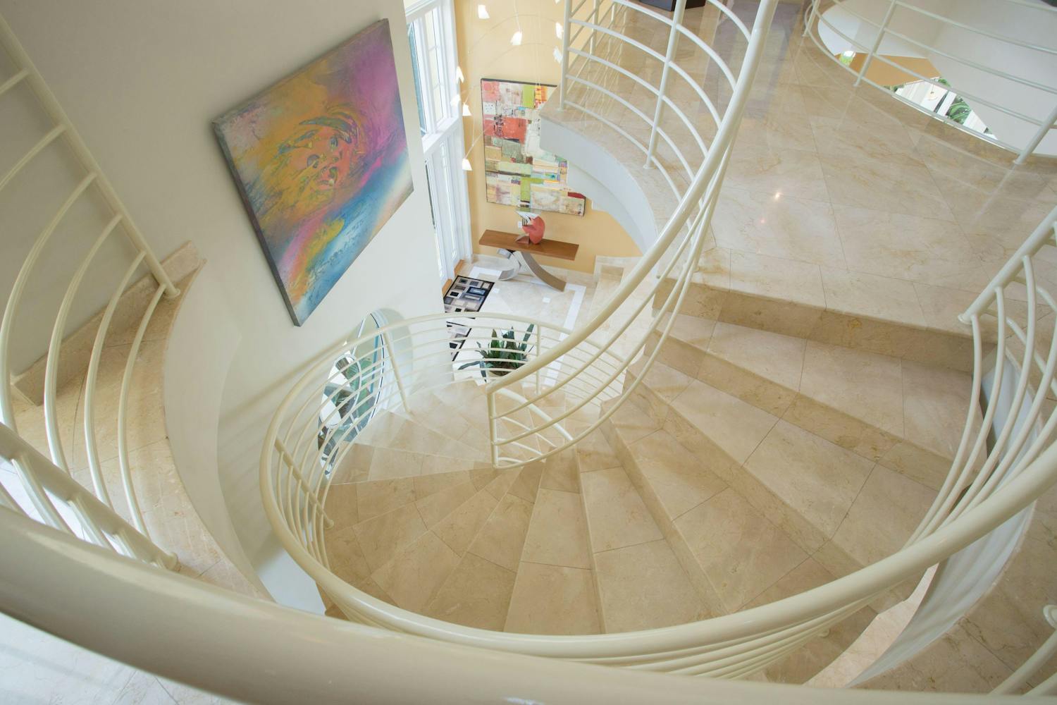 Aerial view of a spiral staircaise with a tiled floor