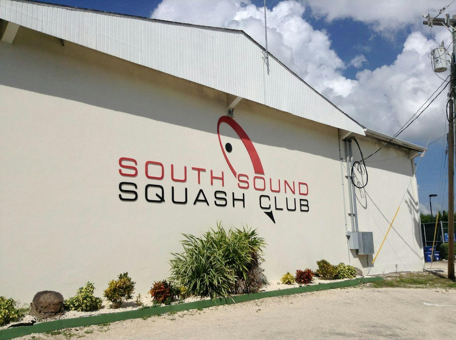 Beige exterior of the south sound squash club building