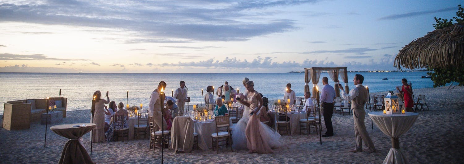 Candlelit sunset wedding on the beach