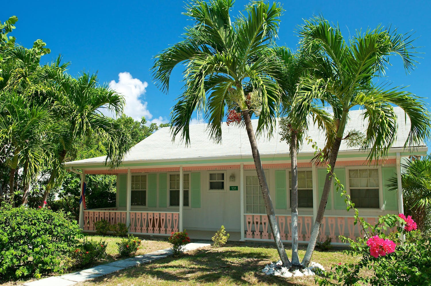 Old cayman style home in light green